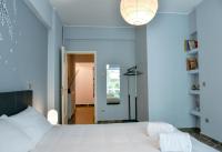 Postel nebo postele na pokoji v ubytování DARSISS 1 - Museum Apartment