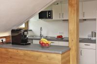Kuchyň nebo kuchyňský kout v ubytování Landhaus Alpenhof