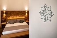 Łóżko lub łóżka w pokoju w obiekcie Le Terrazze di Bellavista