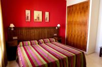 Posteľ alebo postele v izbe v ubytovaní Hotel Rocio