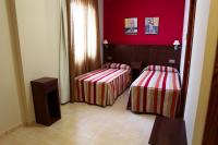 Posteľ alebo postele v izbe v ubytovaní Hotel Rocio