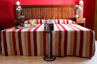 Posteľ alebo postele v izbe v ubytovaní Hotel Rocio