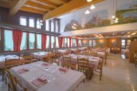 Reštaurácia alebo iné gastronomické zariadenie v ubytovaní GH Hotel Fratazza
