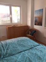 Posteľ alebo postele v izbe v ubytovaní Bungalow at Lake Alte Donau