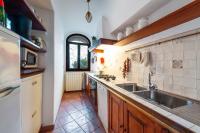 a kitchen with a sink and a counter top at Casa Claudius - Positano in Positano