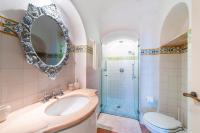 a bathroom with a sink and a shower at Casa Claudius - Positano in Positano