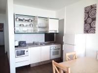 Kuchyň nebo kuchyňský kout v ubytování Azahara Beach 405