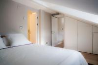 A bed or beds in a room at U-Sense Madrid Santa Ana