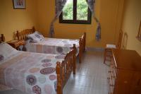 Łóżko lub łóżka w pokoju w obiekcie Casa El Morero