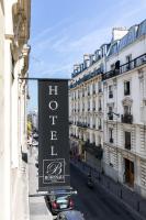 a sign for a hotel on the side of a street at Hotel Boronali in Paris