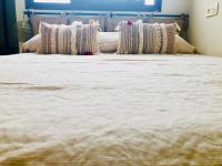 A bed or beds in a room at "Aires de Lumbreras" Duplex Terraza
