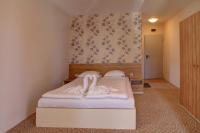 Postel nebo postele na pokoji v ubytování Hotel Mida