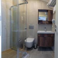 Koupelna v ubytování Joy Suites