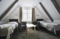 Posteľ alebo postele v izbe v ubytovaní Apartamenty Żuraw