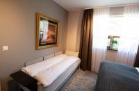 Postel nebo postele na pokoji v ubytování Gardabær Sea View Apartment