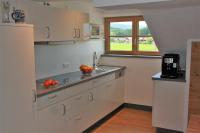 Kuchyň nebo kuchyňský kout v ubytování Landhaus Alpenhof