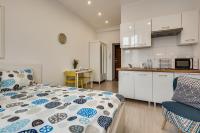 Kuchyňa alebo kuchynka v ubytovaní KATO Apartamenty Centrum
