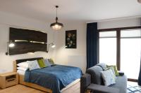 Posteľ alebo postele v izbe v ubytovaní Apartamenty Kora