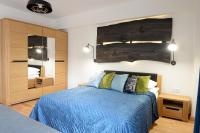 Posteľ alebo postele v izbe v ubytovaní Apartamenty Kora