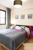 Posteľ alebo postele v izbe v ubytovaní Apartamenty Kora