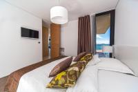 Posteľ alebo postele v izbe v ubytovaní Golden Rays Luxury Villas & Apartments