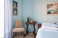 Posteľ alebo postele v izbe v ubytovaní Athens Casa Bonita