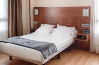Postel nebo postele na pokoji v ubytování Hotel Zalle Don Fernando