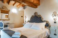 Hotel Vecellio Venice on the Lagoonにあるベッド