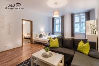 Posteľ alebo postele v izbe v ubytovaní J&J Apartments, Szeroka 25 Apartament 7
