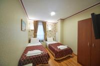 A bed or beds in a room at Hotel Akcinar