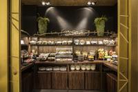 a display cabinet filled with lots of food at Palazzo Navona Hotel in Rome