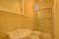 Kúpeľňa v ubytovaní Villa Bonriposo by PosarelliVillas
