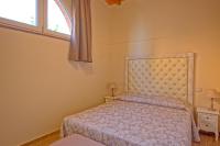 Posteľ alebo postele v izbe v ubytovaní Villa Bonriposo by PosarelliVillas