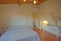 Posteľ alebo postele v izbe v ubytovaní Villa Bonriposo by PosarelliVillas
