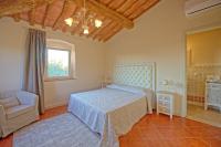 Posteľ alebo postele v izbe v ubytovaní Villa Bonriposo by PosarelliVillas