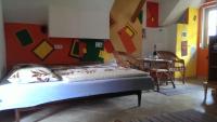 A bed or beds in a room at chata Ivka Leštiny