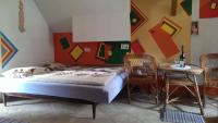 A bed or beds in a room at chata Ivka Leštiny