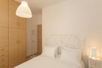 Postel nebo postele na pokoji v ubytování Mary Suites Chania