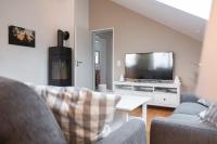 TV a/nebo společenská místnost v ubytování Ferienwohnung Stern