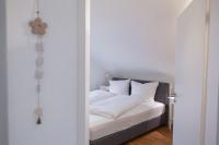 Postel nebo postele na pokoji v ubytování Ferienwohnung Stern