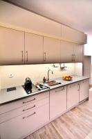 Kuchyňa alebo kuchynka v ubytovaní Apartamenty Sjesta Centrum