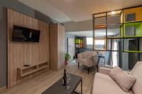 TV a/nebo společenská místnost v ubytování Apartamentos NataLis