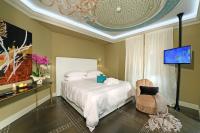 Posteľ alebo postele v izbe v ubytovaní La Ribezza Boutique Hotel