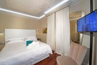 Posteľ alebo postele v izbe v ubytovaní La Ribezza Boutique Hotel