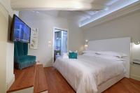 Posteľ alebo postele v izbe v ubytovaní La Ribezza Boutique Hotel