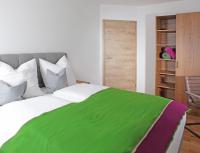 Łóżko lub łóżka w pokoju w obiekcie Appartementhaus Mountain Room