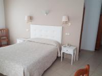 Postel nebo postele na pokoji v ubytování Hostal Centro