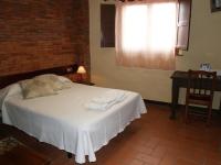 Posteľ alebo postele v izbe v ubytovaní Hotel Rural El Rocal