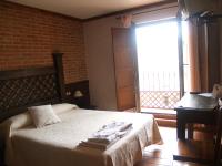 Posteľ alebo postele v izbe v ubytovaní Hotel Rural El Rocal