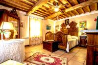 A bed or beds in a room at Podere Biagio